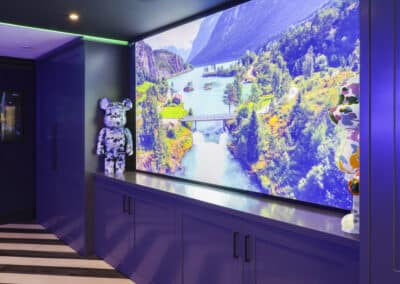 100-inch projection screen in a Cheshire gaming room