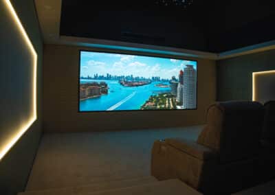 Dedicated two-tier home cinema with 160-inch screen at Wynyard Park