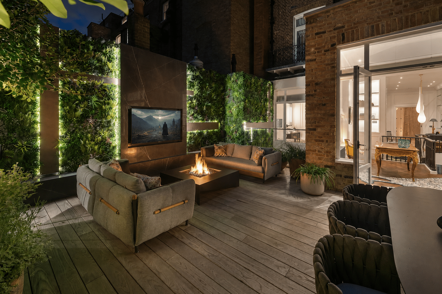 Luxury outdoor terrace at Cadogan Place London with integrated outdoor TV, fire pit and living wall