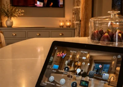 Control4 touchscreen controlling lighting security heating and entertainment in Halifax smart home