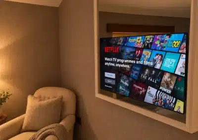 Hidden mirror television in master bedroom of Halifax smart home