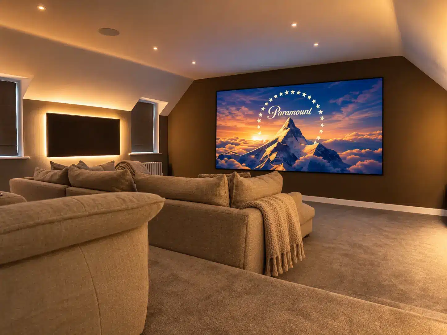 yarm-cinema-rear-2 At the front of the room is a substantial 140-inch acoustically transparent projection screen, paired with an Epson 4K projector.